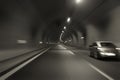 Car speeding through motorway tunnel motion blur