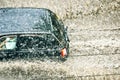 Car splash through flood water after heavy rain Royalty Free Stock Photo