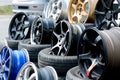 Car sport rims and tyres shown at a tyre shop.