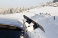 Women,s legs in snowboard from the car near beauty view of mountains and christmas trees in winter Royalty Free Stock Photo