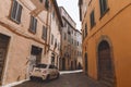 car standing in lane in old city, Royalty Free Stock Photo