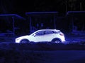 Car Stay On A Snowy Road Kerb At Winter Night