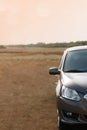 Car in the steppe, rear view mirror