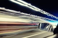 Car streaks of light in tunnel