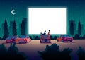 Car street cinema. Drive-in theater with automobiles stand in open air parking at night. Large outdoor screen. Cinema Royalty Free Stock Photo