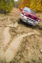 Car stuck in muddy road Royalty Free Stock Photo