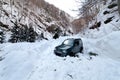 Car stuck in a snow avalanche