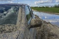 Car stuck in swamp. Off road trip