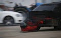 Car stunts on circuit pushing up Royalty Free Stock Photo