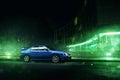 Car Subaru Impreza WRX stand in Moscow city near modern buildings at night Royalty Free Stock Photo