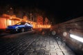 Car Subaru Impreza WRX stand in Moscow city near modern buildings at night Royalty Free Stock Photo