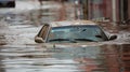 A car submerged in murky waistdeep floodwater with its windshield wipers still moving as the aftermath of a citywide