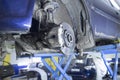 Car suspension repair. Replacement of brake discs and pads Royalty Free Stock Photo