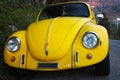 Car symbol of a bygone era. vintage style car. old canary yellow transport system