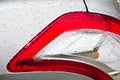 Car tail light with water drop Royalty Free Stock Photo