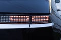 Car taillight. LED red taillight. Closeup tail light of a modern car. Rear light of a car. Rear lamp signals for turning Royalty Free Stock Photo