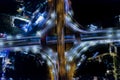 Car, taxi, and bus traffic on road intersection at night, traffic transportation, Asia city life, public transportation, financial