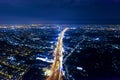 Car, taxi, and bus traffic on road intersection at night, traffic transportation, Asia city life, public transportation, financial