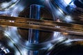 Car, taxi, and bus traffic on road intersection at night, traffic transportation, Asia city life, public transportation, financial