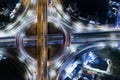 Car, taxi, and bus traffic on road intersection at night, traffic transportation, Asia city life, public transportation, financial