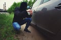 Car theft, Breaking the lock in the car door Royalty Free Stock Photo