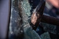 Car thief breaks the car window Royalty Free Stock Photo