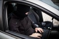 Car Thief tries to disarm car security systems Royalty Free Stock Photo