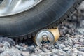 Car tire on can Royalty Free Stock Photo