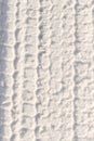 Car tire close up view on snow Royalty Free Stock Photo