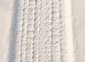 Car tire close up view on snow Royalty Free Stock Photo