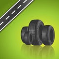 Car tire on green background