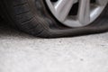 Car tire leak because of nail pounding. flat tyre on road. Flatt Royalty Free Stock Photo