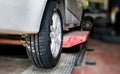 Car tire maintenance and replacement in garage