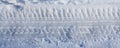car tire marks on the snow, tire marks on the snow Royalty Free Stock Photo