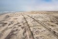 Car tire tracks in the sand of Skeleton Coast, Namibia Royalty Free Stock Photo