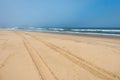 Car tire tracks in the sand of Skeleton Coast, Namibia Royalty Free Stock Photo