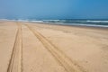 Car tire tracks in the sand of Skeleton Coast, Namibia Royalty Free Stock Photo