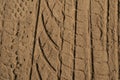 car tire tracks in the sand Royalty Free Stock Photo