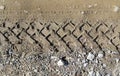 Car tire tracks on wet muddy trail royalty, road, abstract background, texture material. Tyre track on dirt sand or mud, retro Royalty Free Stock Photo