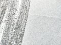 Car tire tread marks in the snow. Royalty Free Stock Photo