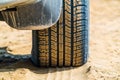 Car tire tread pattern on sand Royalty Free Stock Photo
