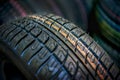 Car tires new macro, fragment, blurred background Royalty Free Stock Photo