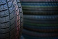 Car tires new macro, fragment, blurred background Royalty Free Stock Photo