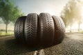 Car tires on a summer road Royalty Free Stock Photo