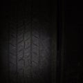 Car tires in a row on a shelf tire. Royalty Free Stock Photo