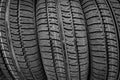 Car tires in a row on a shelf tire. Royalty Free Stock Photo