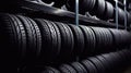 Rows of car tires on a shelf in a car shop. Royalty Free Stock Photo