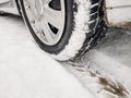 Car tires on snow. Car in the snow