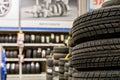 Car tires and wheels at warehouse in tire store