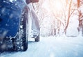 Car tires on winter road Royalty Free Stock Photo